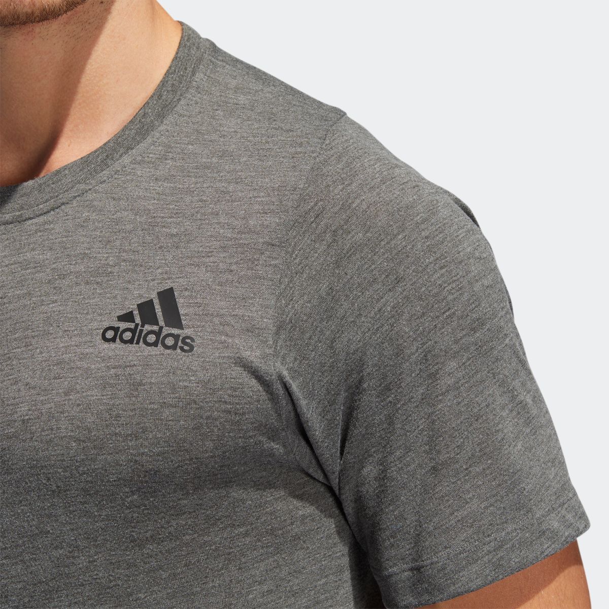 ÁO Adidas FreeLift Sport Prime Heather Tee DX9485