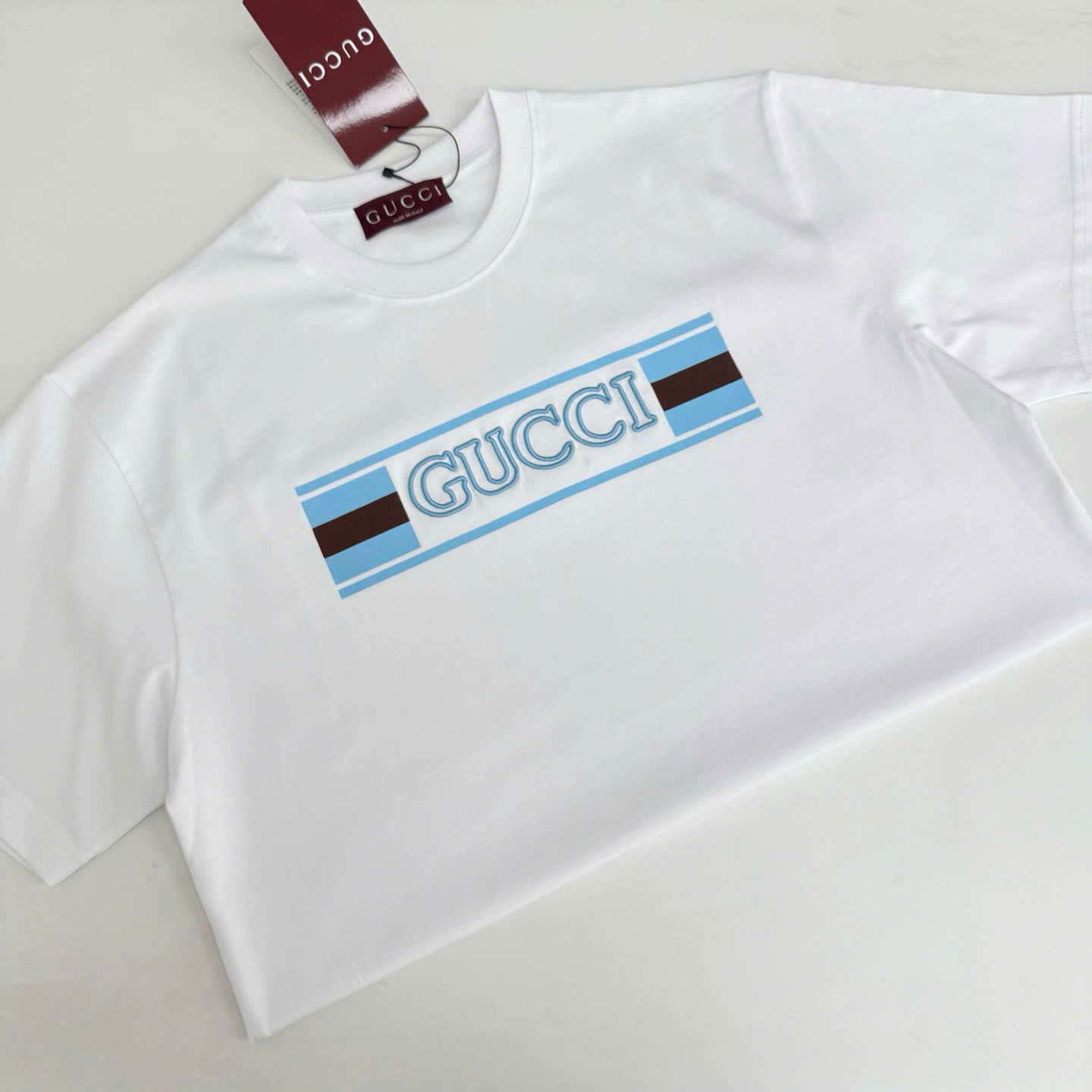 ÁO THUN GUCCI GC LOGO SS25 BLUE (WHITE)