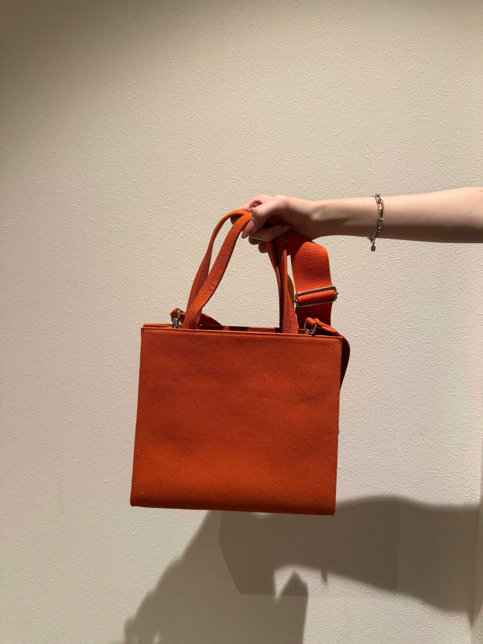 TÚI PRADA DRILL HANDLE BAG (ORANGE)