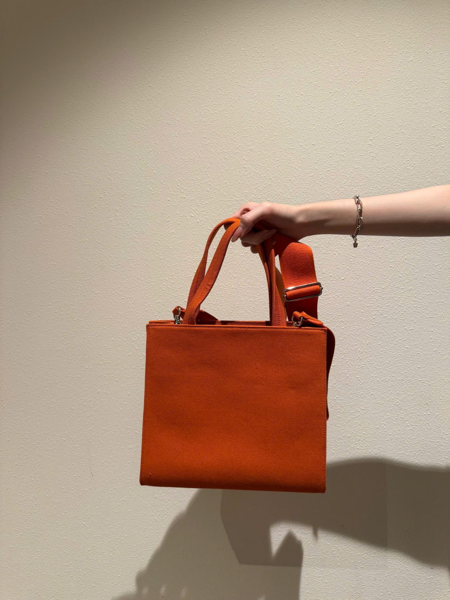 TÚI PRADA DRILL HANDLE BAG (ORANGE)