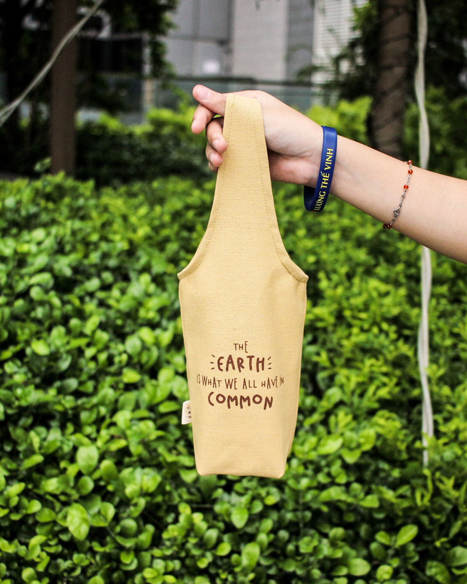 Yellow - The Earth Is What We All Have In Common Canvas One-strap Cup Holder