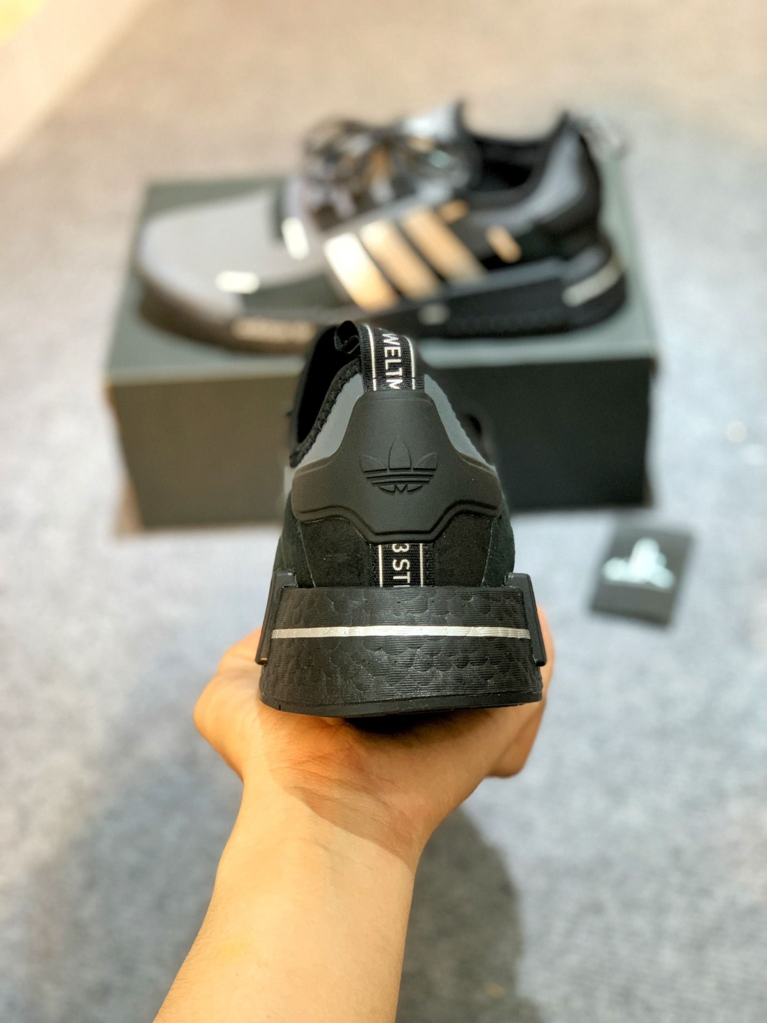 GZ7946 NMD R1 Black Carbon Metallic