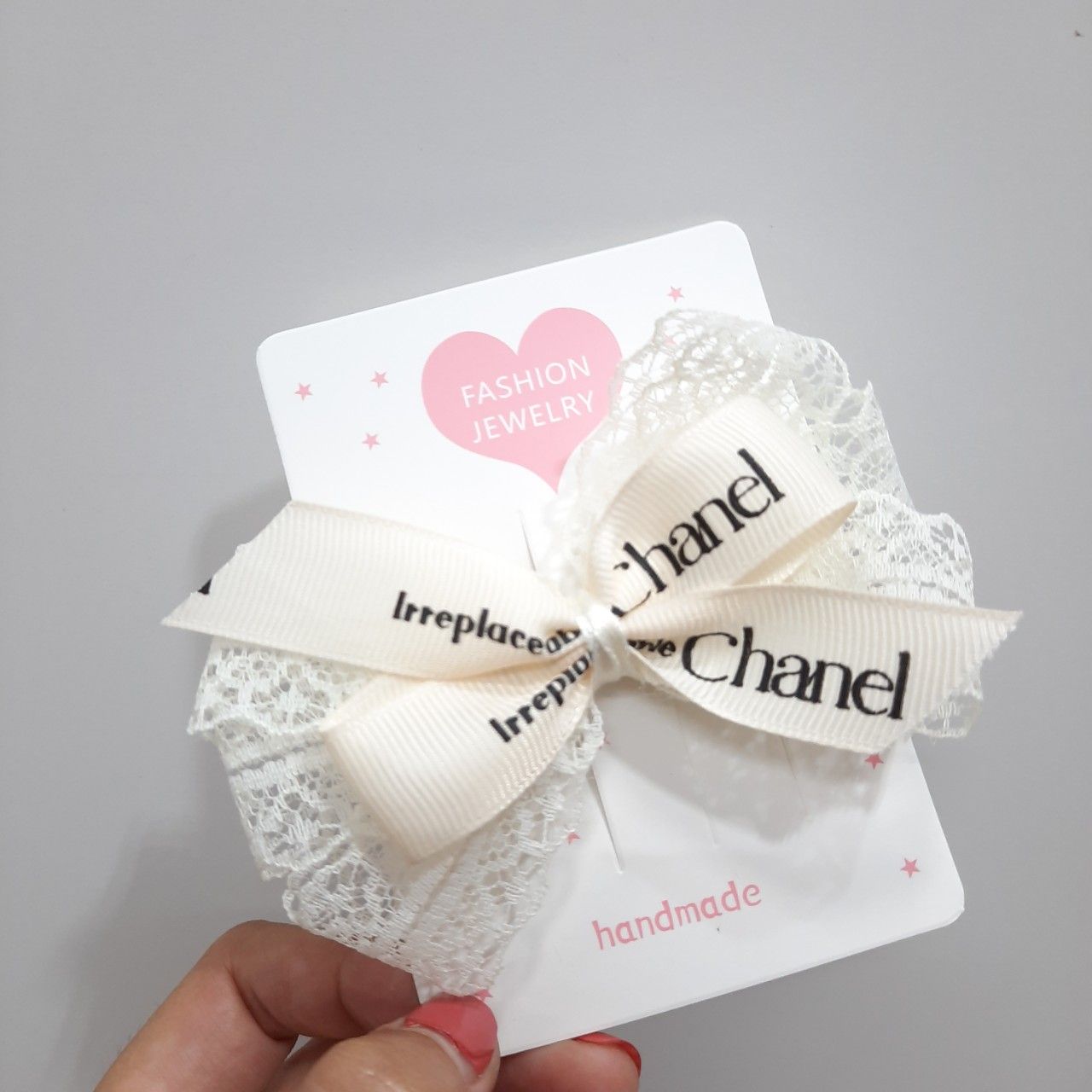 Kẹp tóc nơ ruy băng gân Chanel KT03