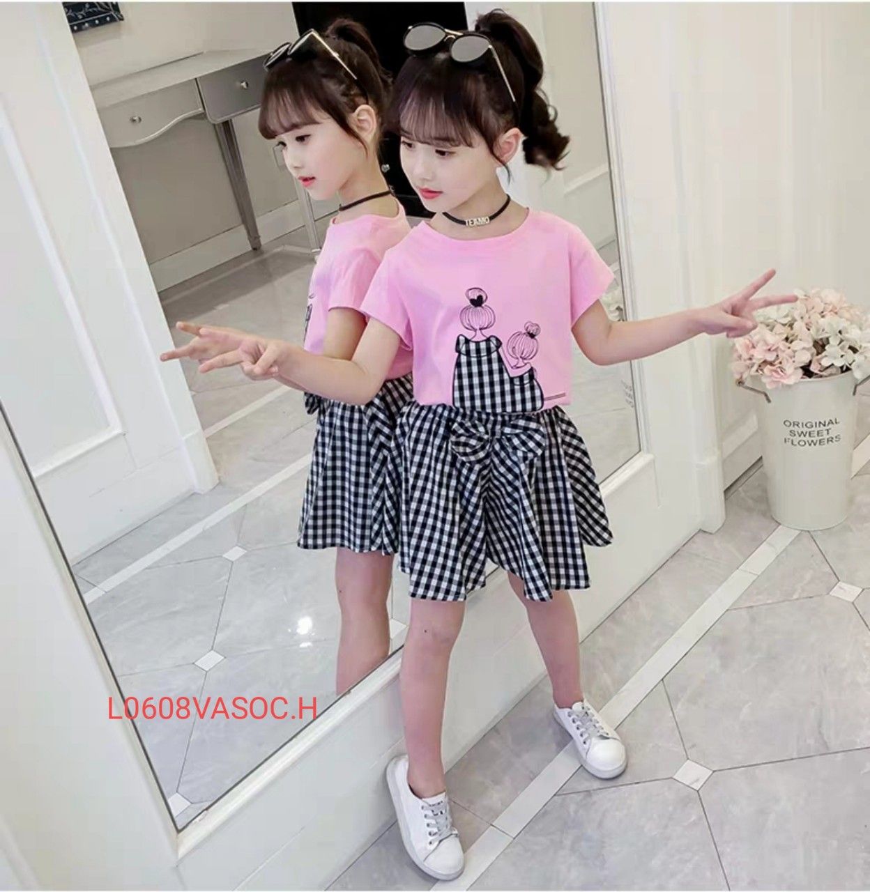 Set áo hồng váy caro nơ
