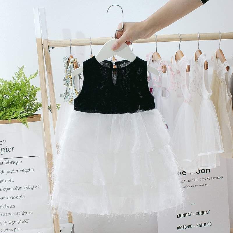 Đầm nhũ phối lông vũ bé gái