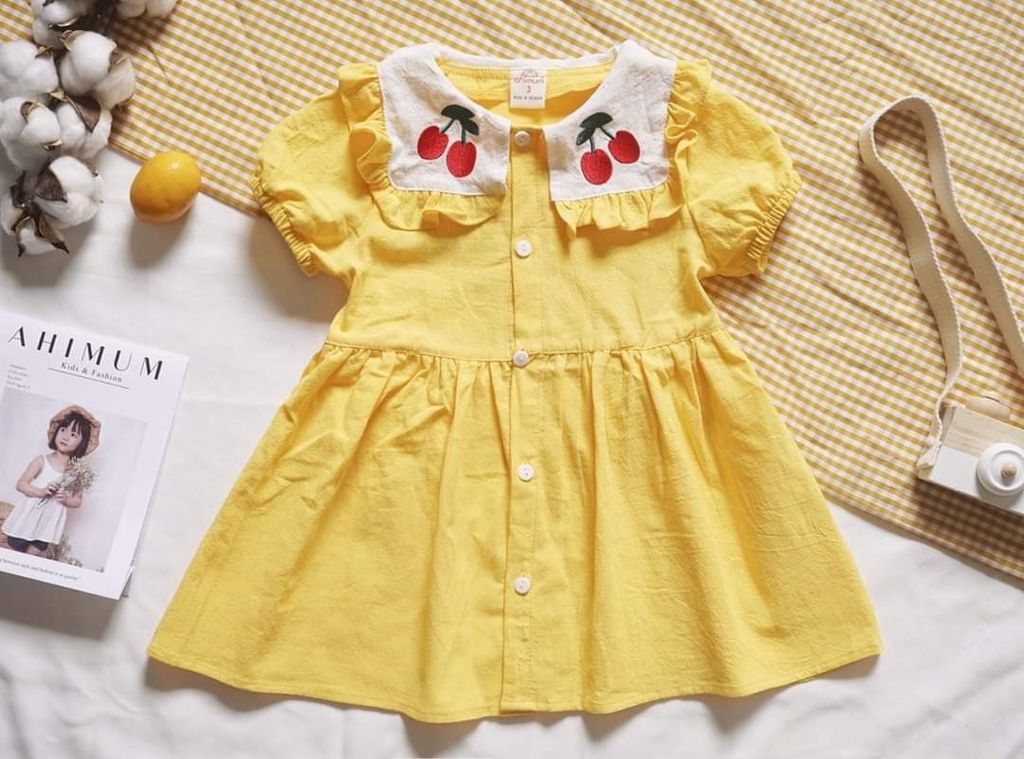 Đầm vàng cherry bé gái