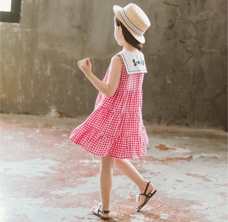 Đầm caro cổ sen trắng bé gái