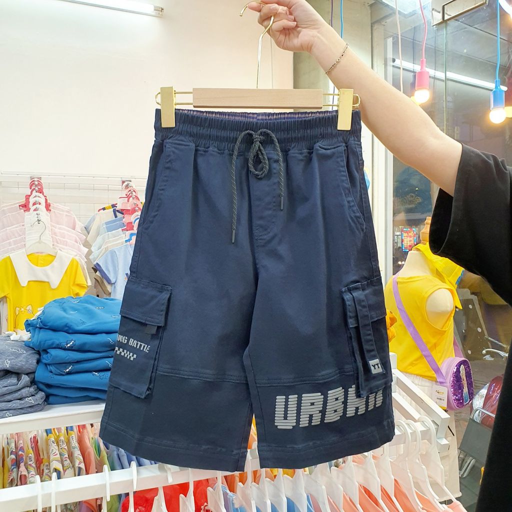 Quần kaki lửng bé trai tuổi teen dây rút chữ Urban