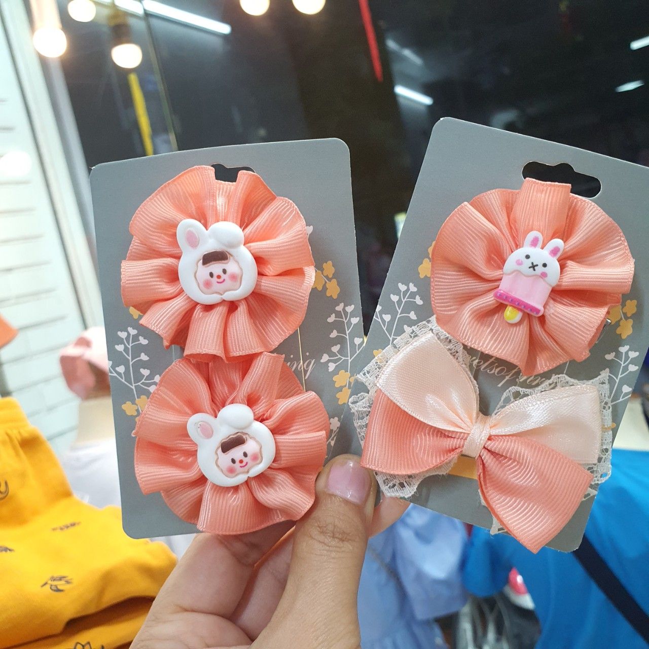 Set 2 kẹp tóc nơ ruy băng gân màu cam nhẹ nhàng cho bé gái