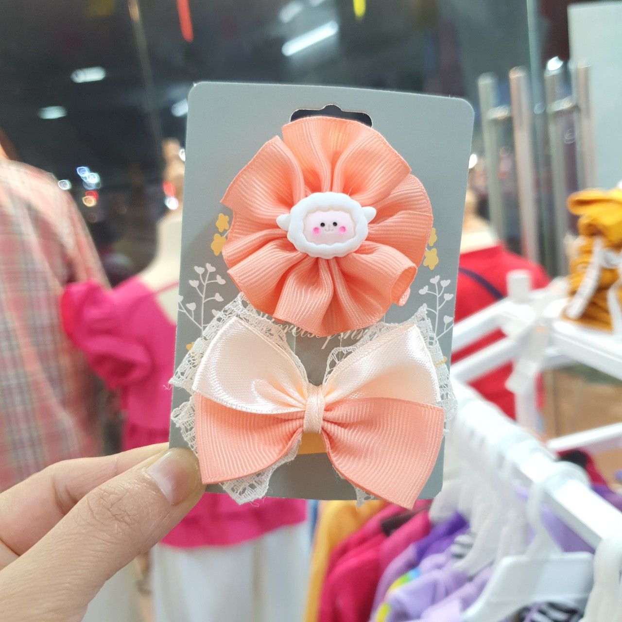 Set 2 kẹp tóc nơ ruy băng gân màu cam nhẹ nhàng cho bé gái