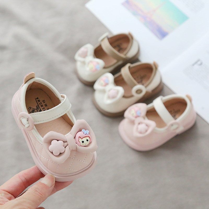Giày búp bê tập đi da mềm nơ đính charm xinh xắn cho bé gái từ 1 đến 4 tuổi