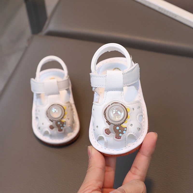 Giày sandal tập đi cho bé đế mềm chống trơn trợt có kèn hình khủng long xinh xắn