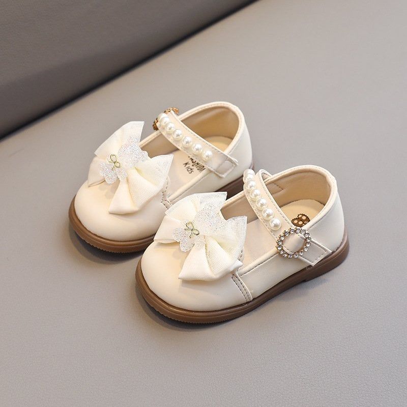 Giày búp bê tập đi da mềm nơ đính charm gấu xinh xắn cho bé gái từ 0-1 tuổi