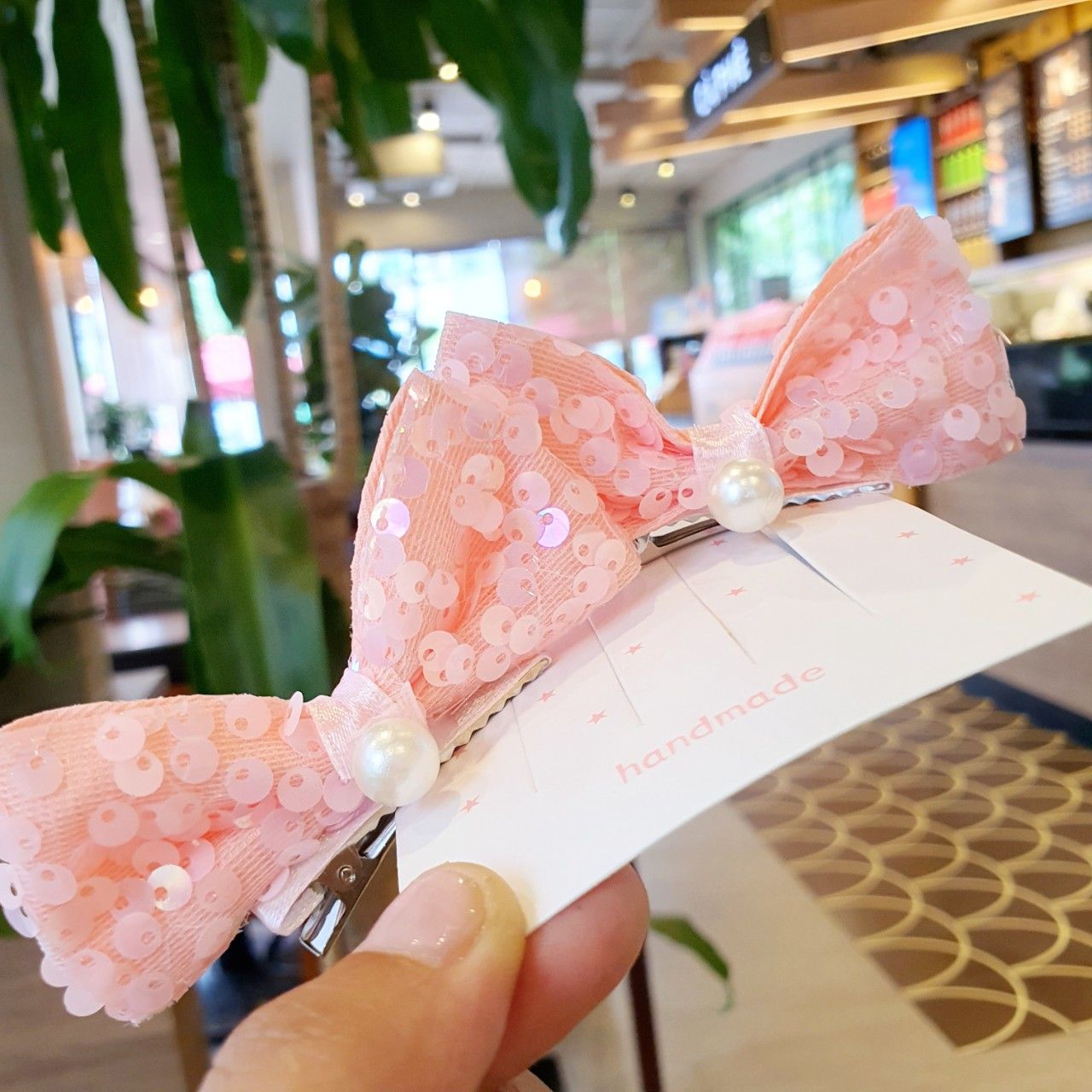 Set 2 kẹp tóc nơ kim sa lấp lánh cho bé