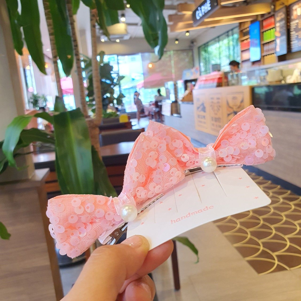 Set 2 kẹp tóc nơ kim sa lấp lánh cho bé