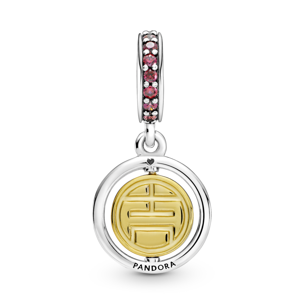 Lucky sterling silver and 14k gold-plated spinning dangle with red CZ