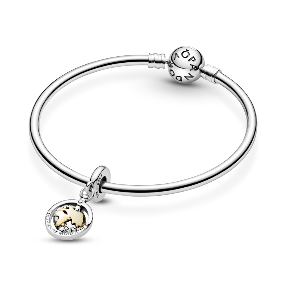 Spinning world sterling silver and 14k gold dangle with CZ