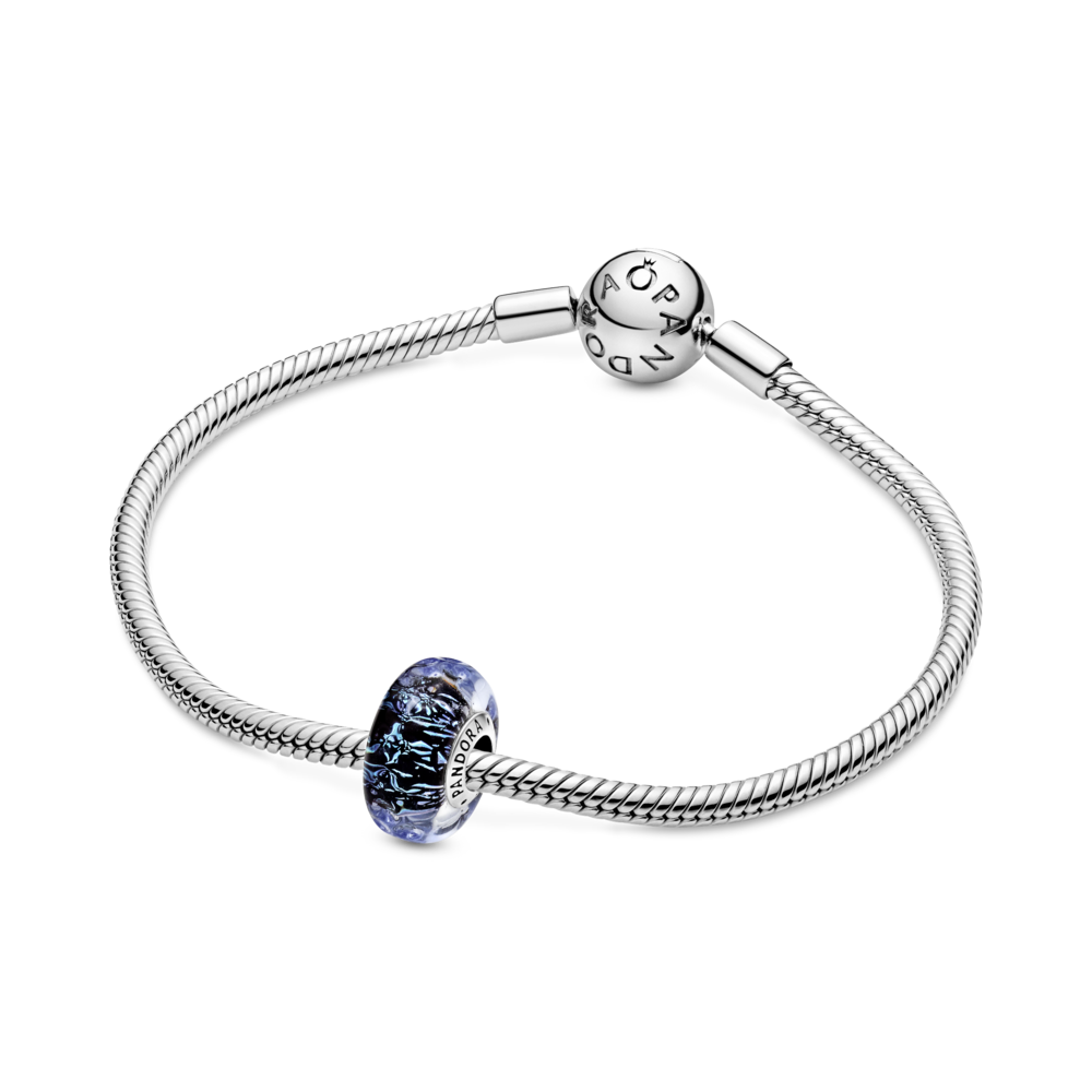 Wavy sterling silver charm with iridescent and dark blue Murano glass