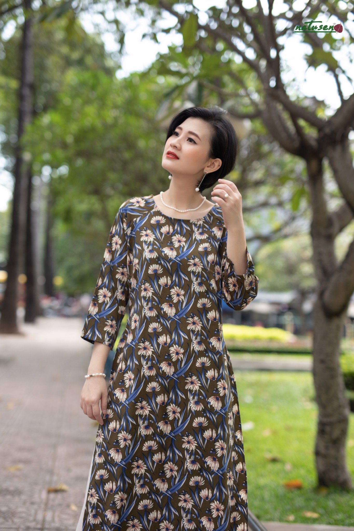 Áo dài không pen xanh in hoa cúc