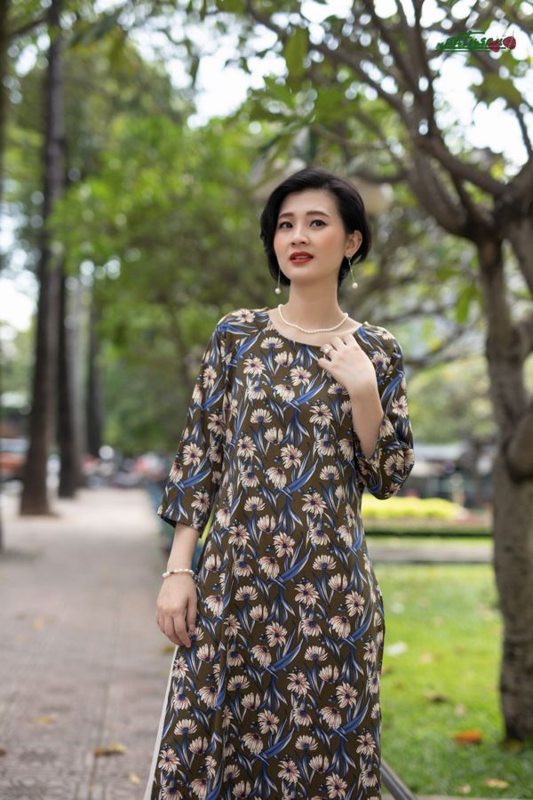 Áo dài pen ôm xanh in hoa cúc