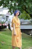  Đầm thêu tay Cúc Quỳnh vàng mustard WarpDress 