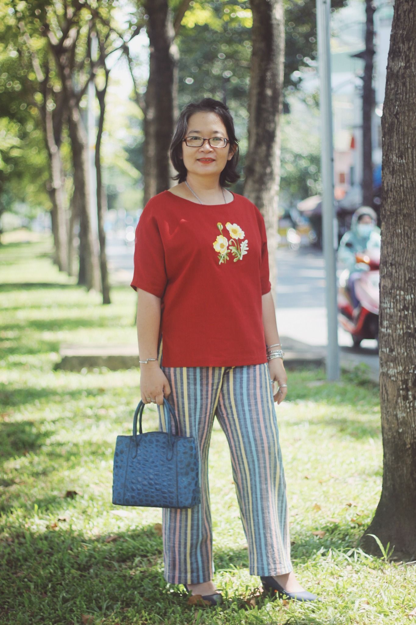 Áo cam gạch tay liền thêu Poppy vàng