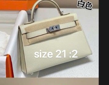 Túi HM kely tag bạc (*)