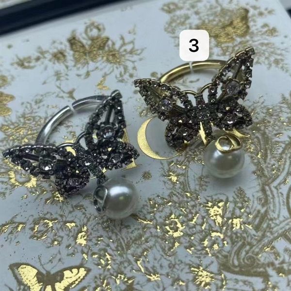 Nhẫn D bướm đá ngọc rủ