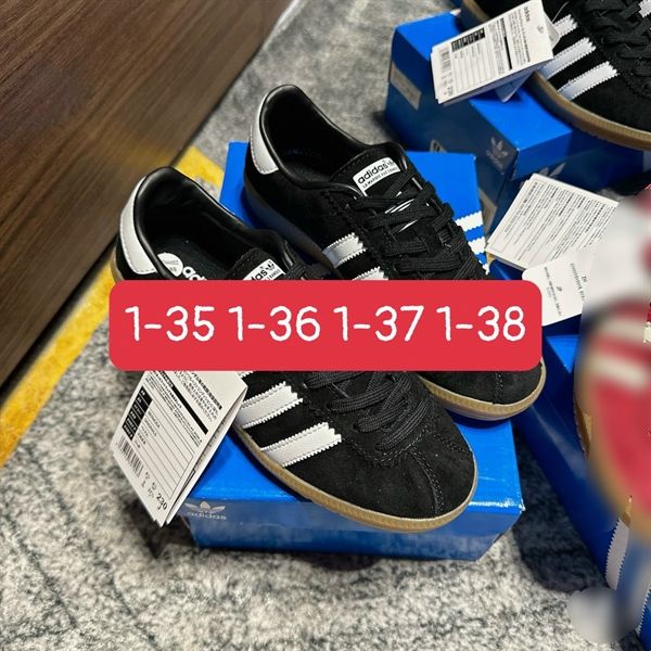 Giày TT Adidas đen lộn sọc trắng (*)