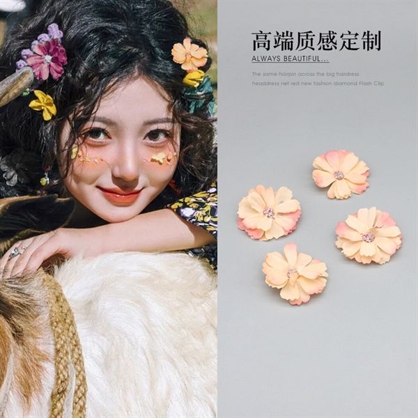 Kẹp tóc hoa mini cánh dài