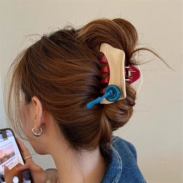 Kẹp càng cua cúc áo