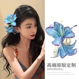 Kẹp càng cua hoa loa kèn