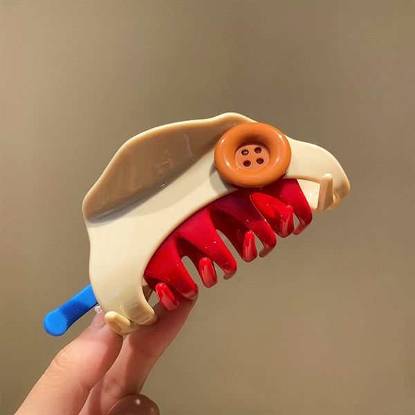 Kẹp càng cua cúc áo