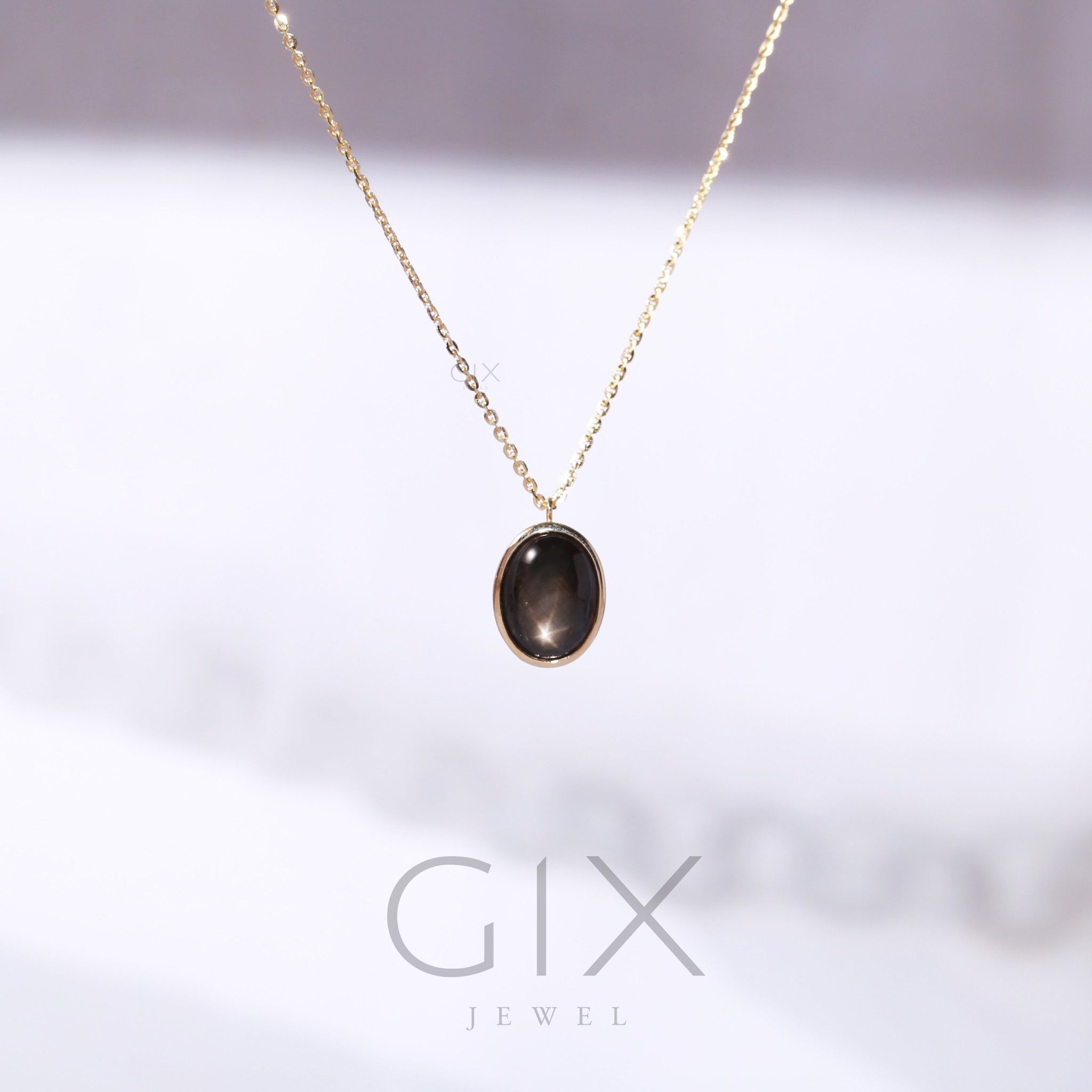 Dây chuyền bạc đính đá Sapphire sao đen Gix Jewel