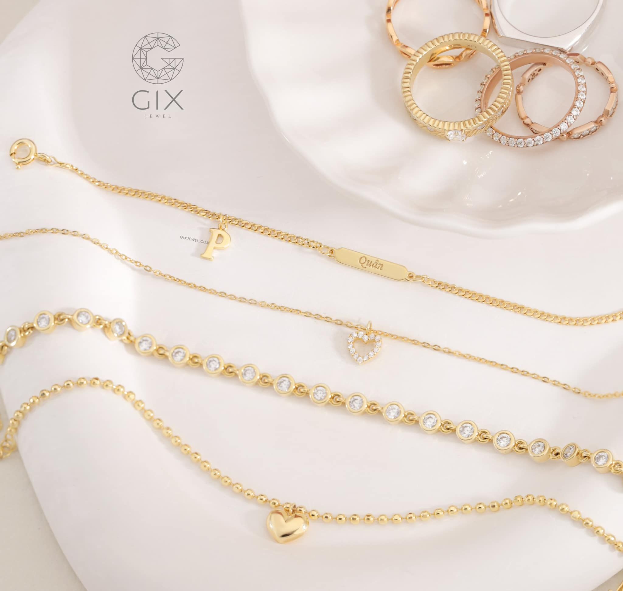 Lắc tay bạc vàng 18k dưới 3 triệu sợi chữ cong hình trái tim đính kim cương đẹp Gix