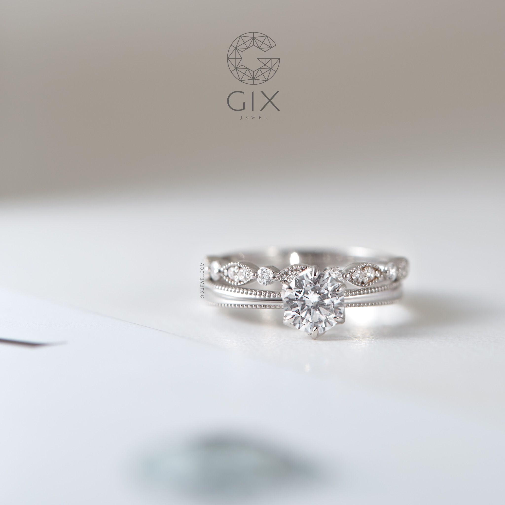 Nhẫn đính hôn kim cương đẹp vàng trắng 18k đính kim cương Moissanite Gix Jewel