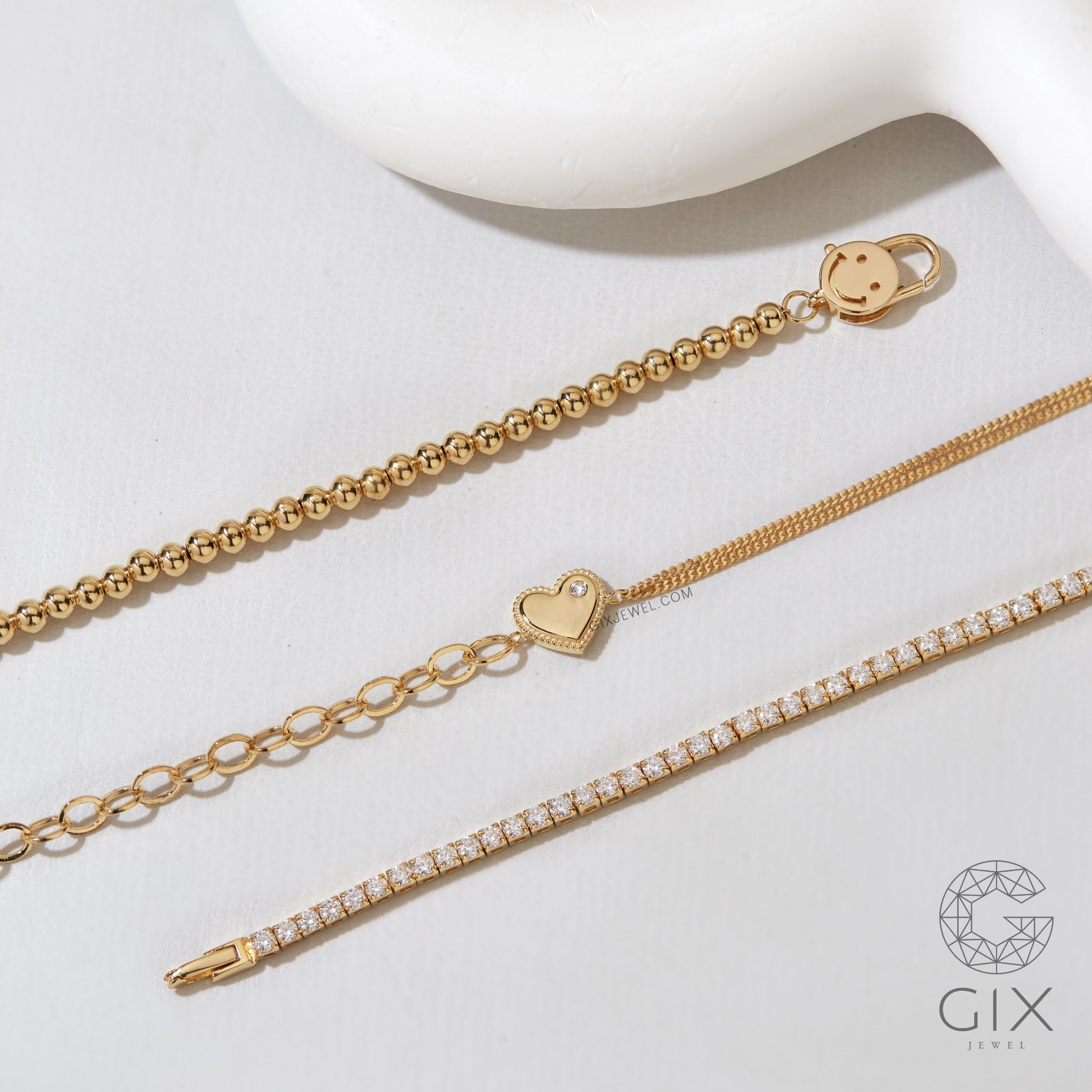 Vòng tay vàng mắc xích vuông kèm dây khoen lật hình trái tim gắn đá quý Gix Jewel