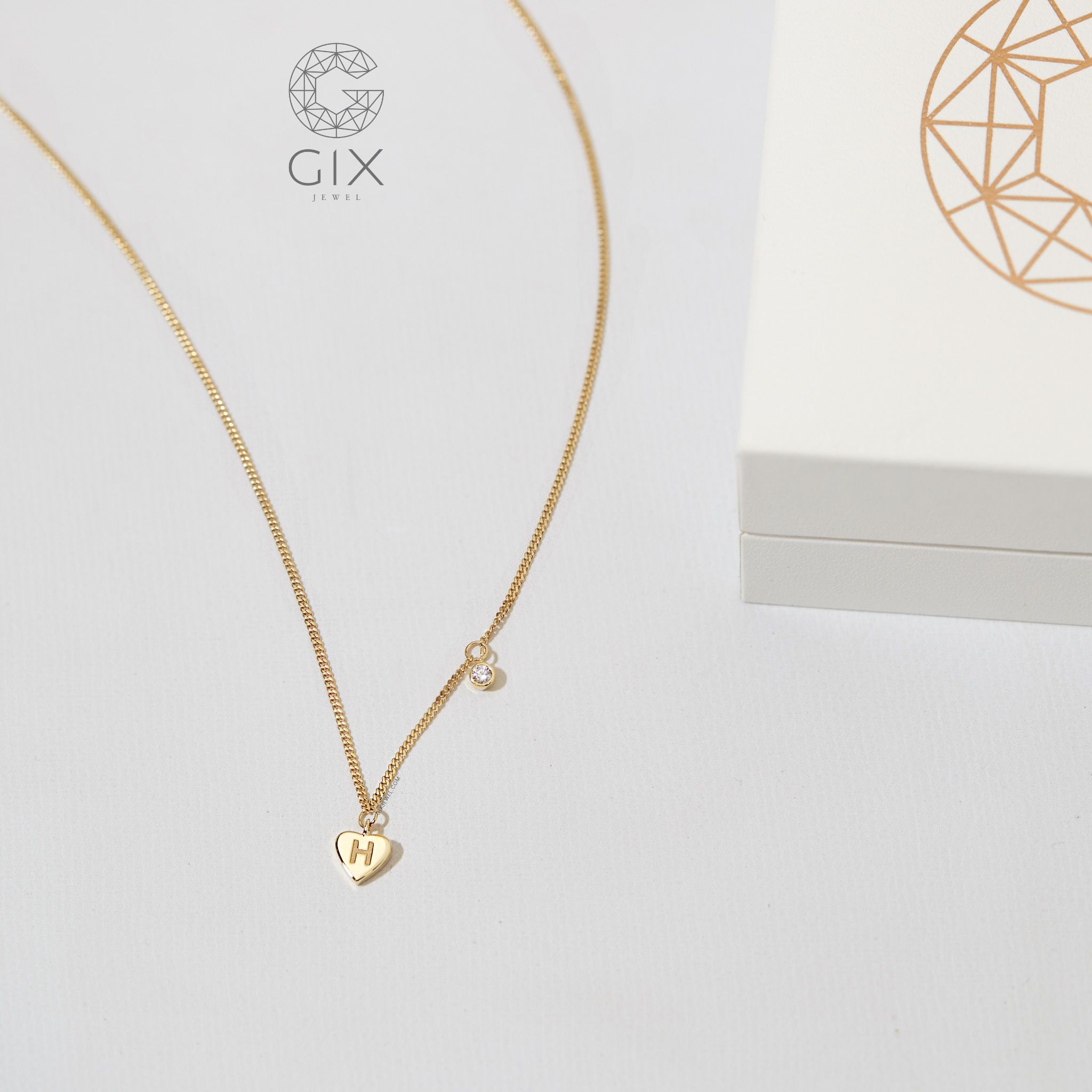 Dây chuyền khắc tên khoen lật vàng 18k mặt trái tim đính đá cao cấp Gix Jewelry