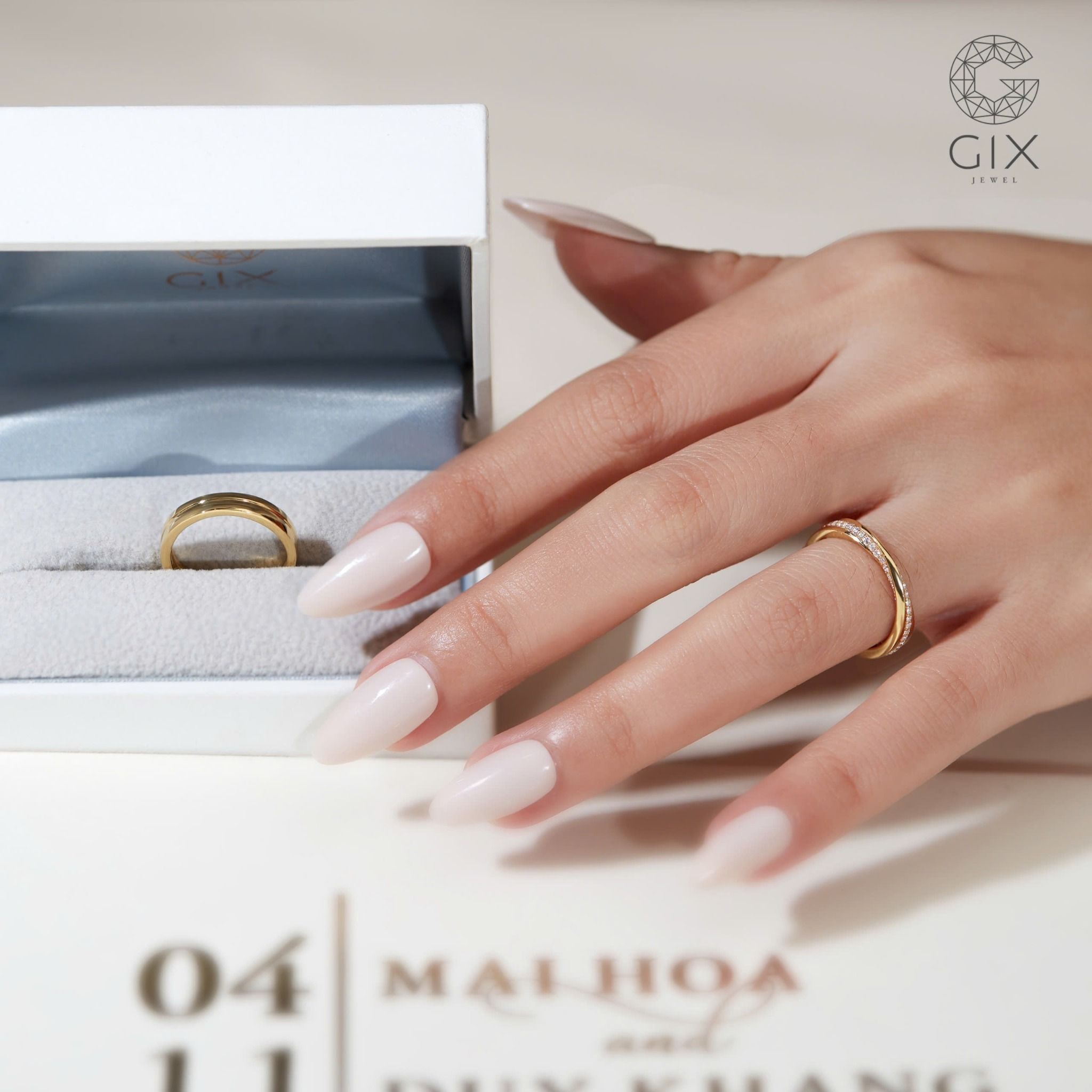 Nhẫn cưới cặp Mobius vô cực vàng trắng 18k đính kim cương hột xoàn đẹp Gix Jewel