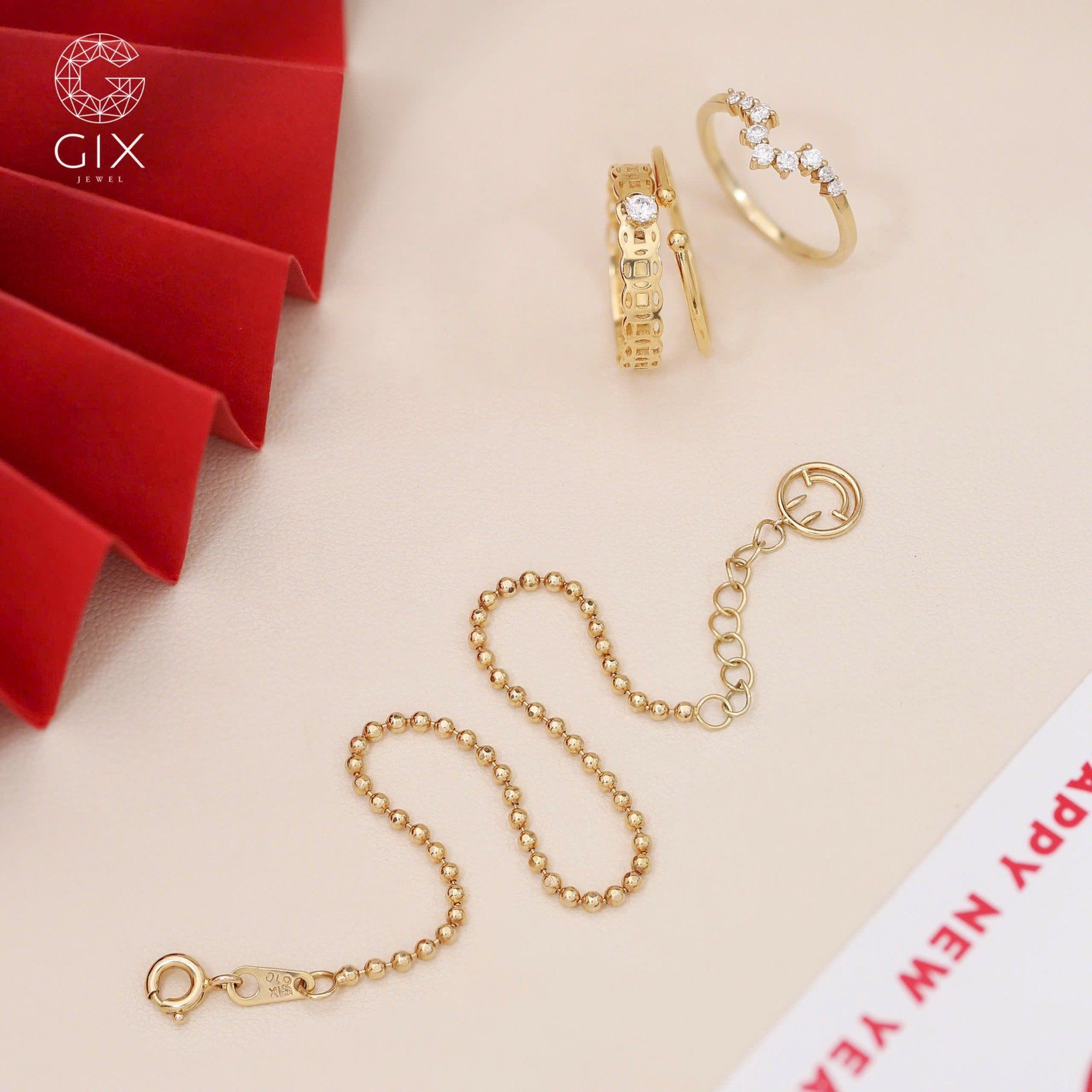 Lắc tay bi nữ vàng 18k bạc đẹp gắn charm mặt cười nhỏ xinh Gix