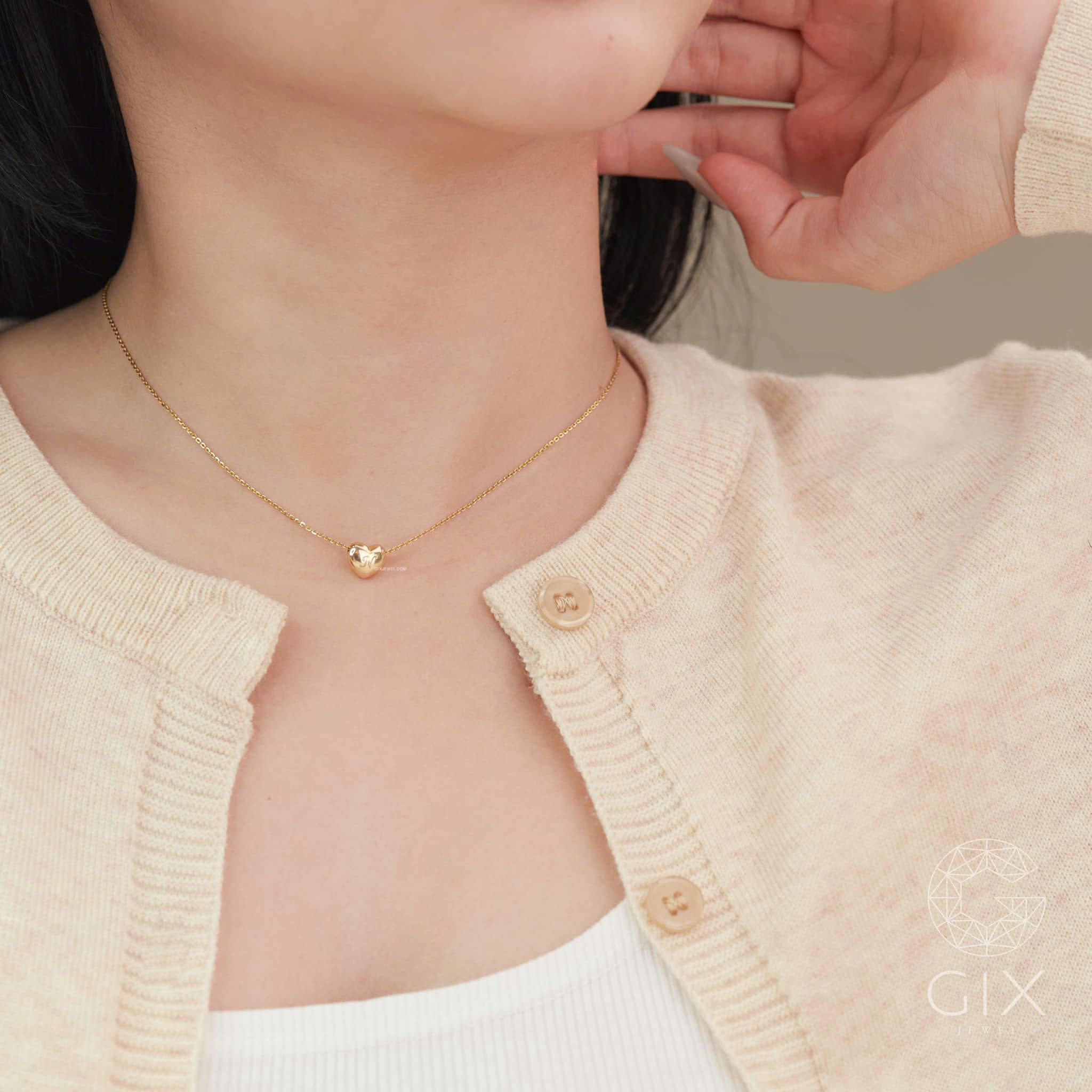 Mặt dây chuyền trái tim bạc và vàng 18k khắc chữ theo yêu cầu