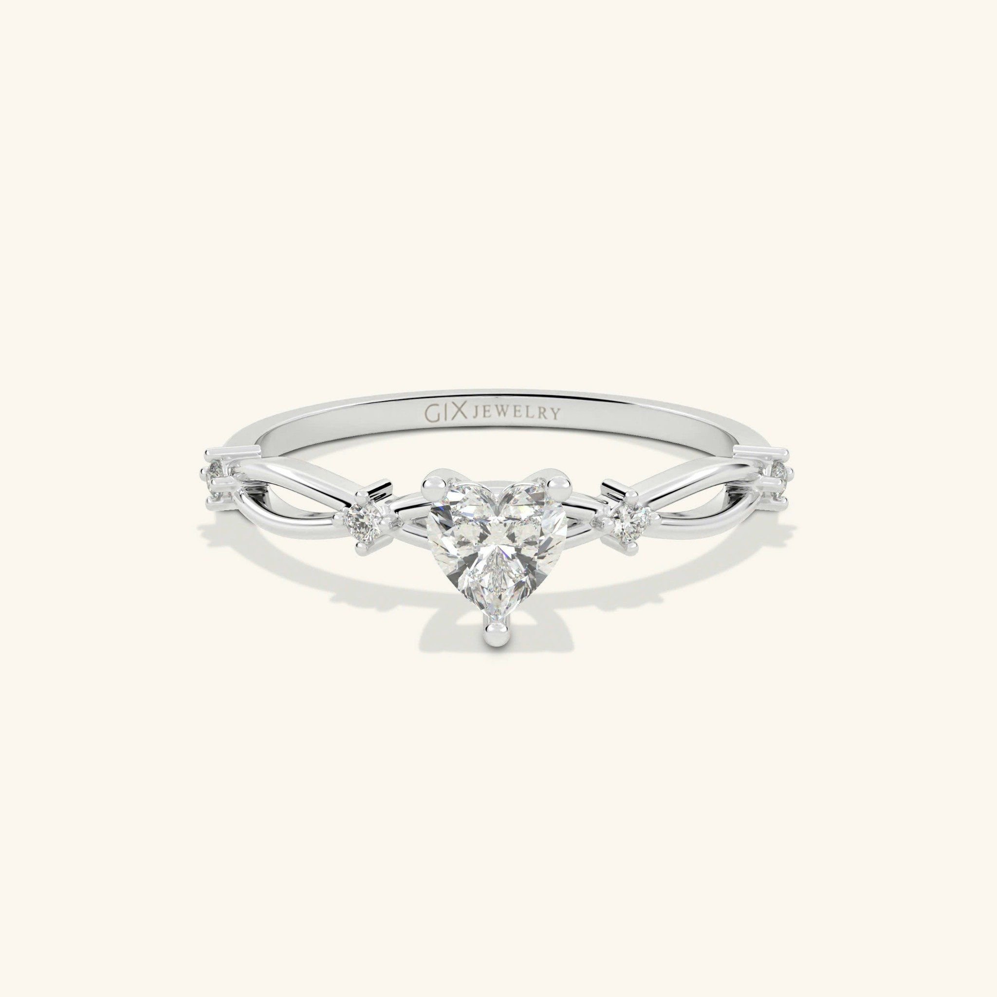 Nhẫn Cầu Hôn Twist Of Love Vàng 18K Đính Kim Cương Hình Trái Tim Gix Jewel