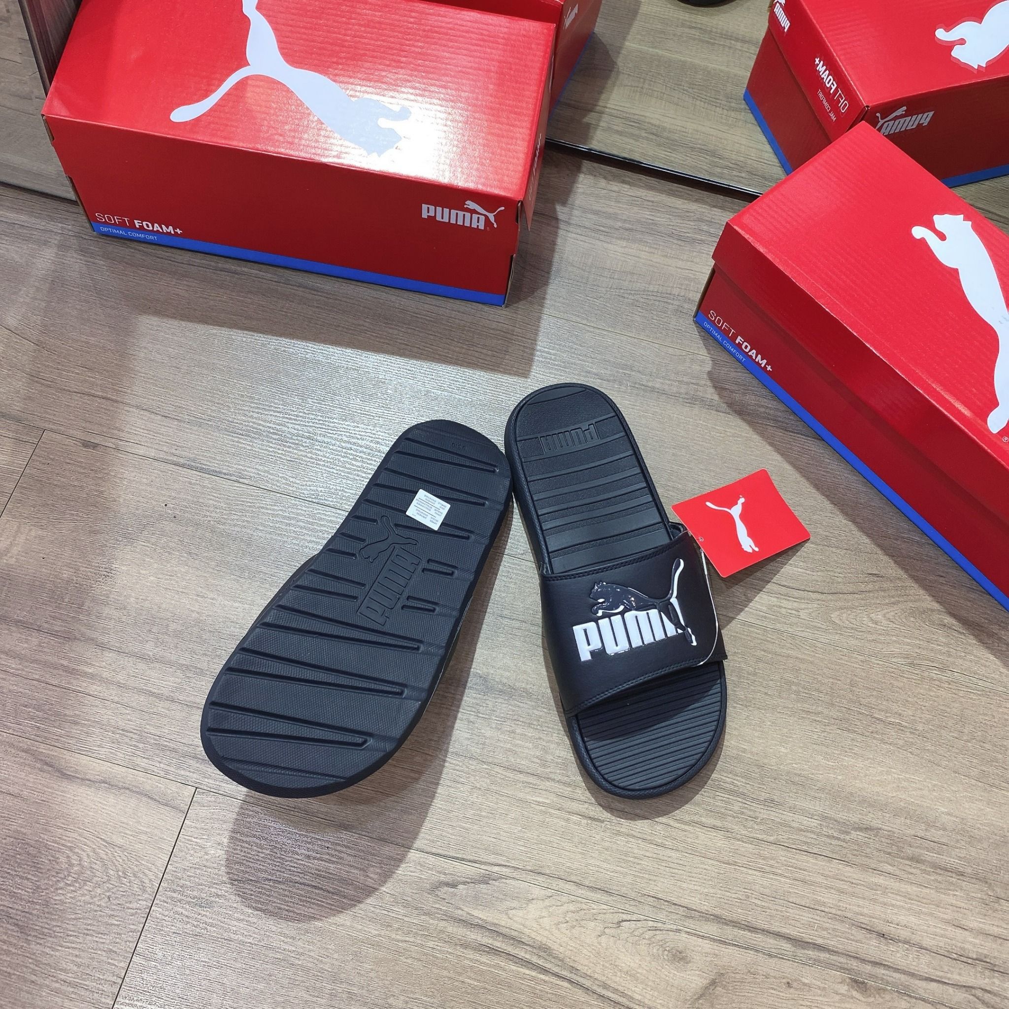 0525 - HÀNG CHÍNH HÃNG - DÉP QUAI NGANG PUMA COOL CAT MÀU ĐEN LOGO TRONG SUỐT - *BLACK/WHITE* - CODE: 383441 01
