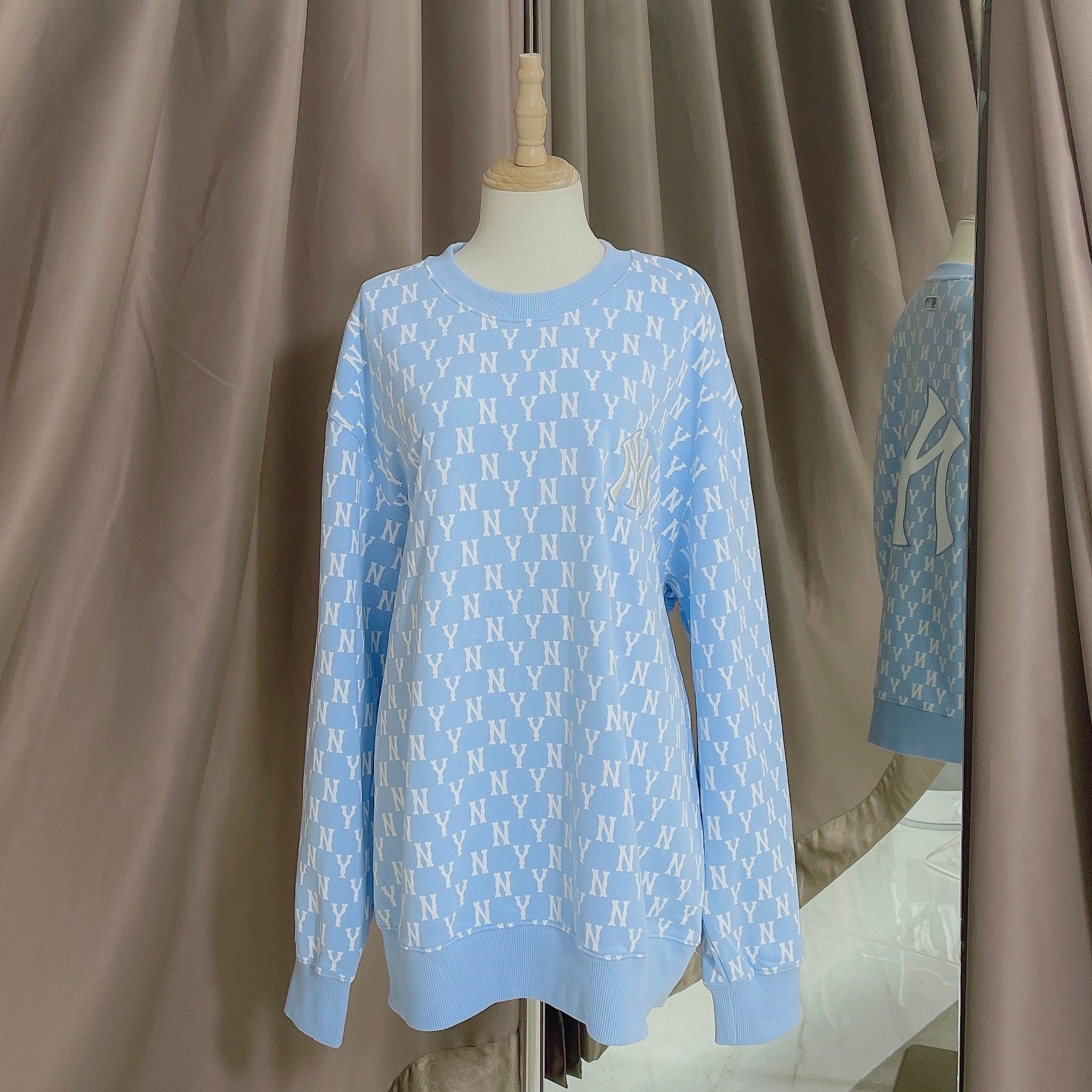 1662 - HÀNG CHÍNH HÃNG - ÁO SWEATER MLB MONOGRAM ALLOVER OVERFIT SWEATSHIRT NEW YORK *NY BABYBLUE* - CODE: 3AMTM0221-50BLL
