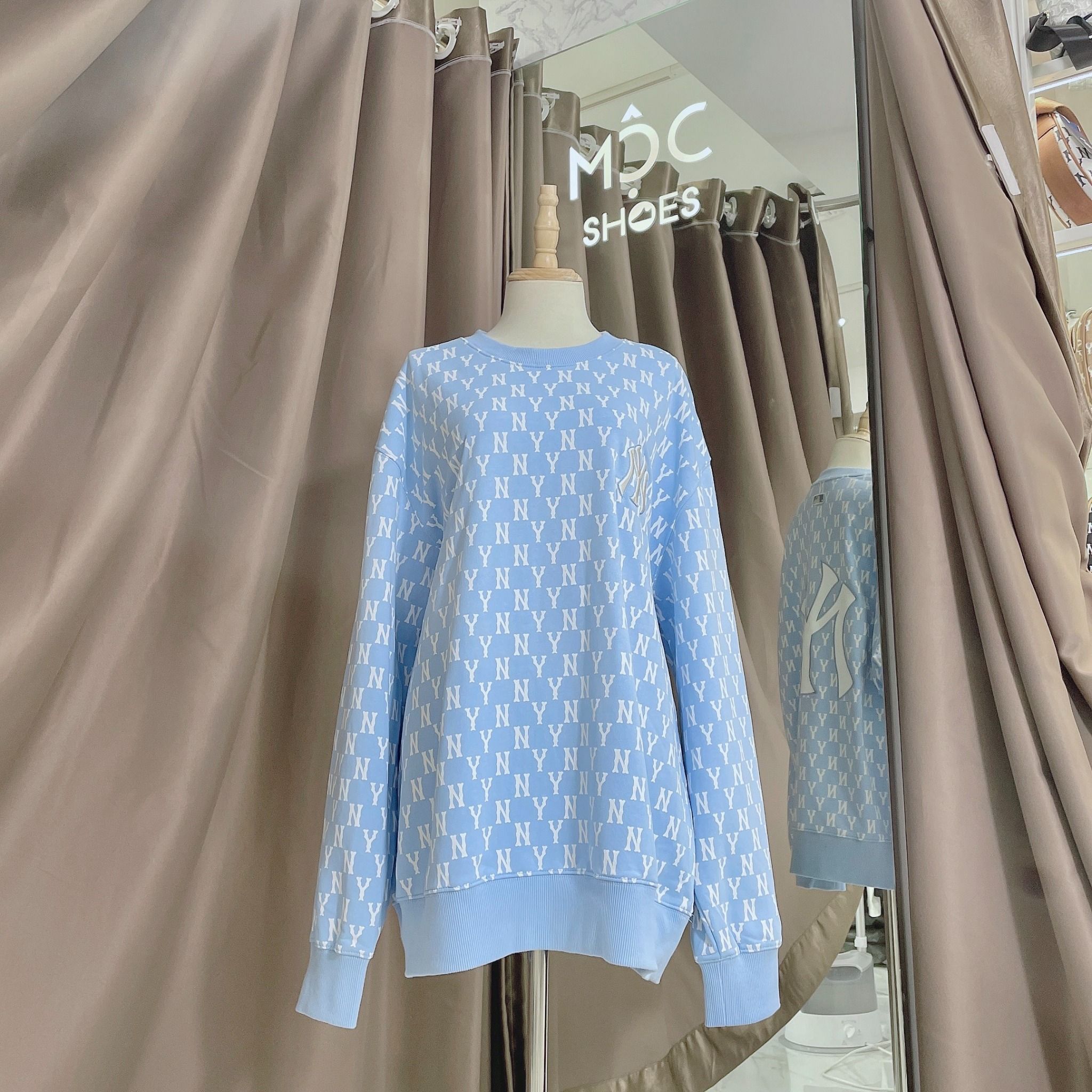 1662 - HÀNG CHÍNH HÃNG - ÁO SWEATER MLB MONOGRAM ALLOVER OVERFIT SWEATSHIRT NEW YORK *NY BABYBLUE* - CODE: 3AMTM0221-50BLL