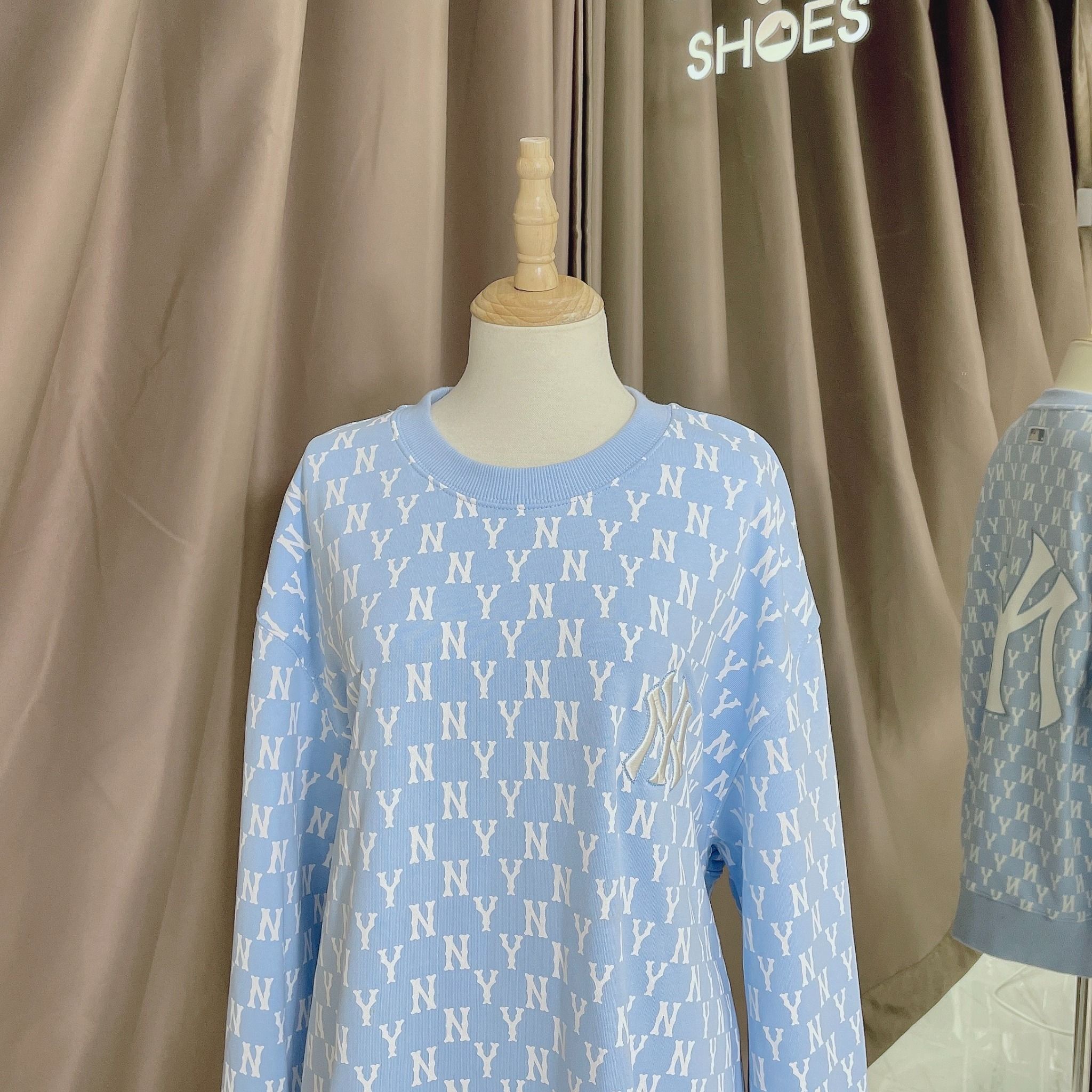 1662 - HÀNG CHÍNH HÃNG - ÁO SWEATER MLB MONOGRAM ALLOVER OVERFIT SWEATSHIRT NEW YORK *NY BABYBLUE* - CODE: 3AMTM0221-50BLL