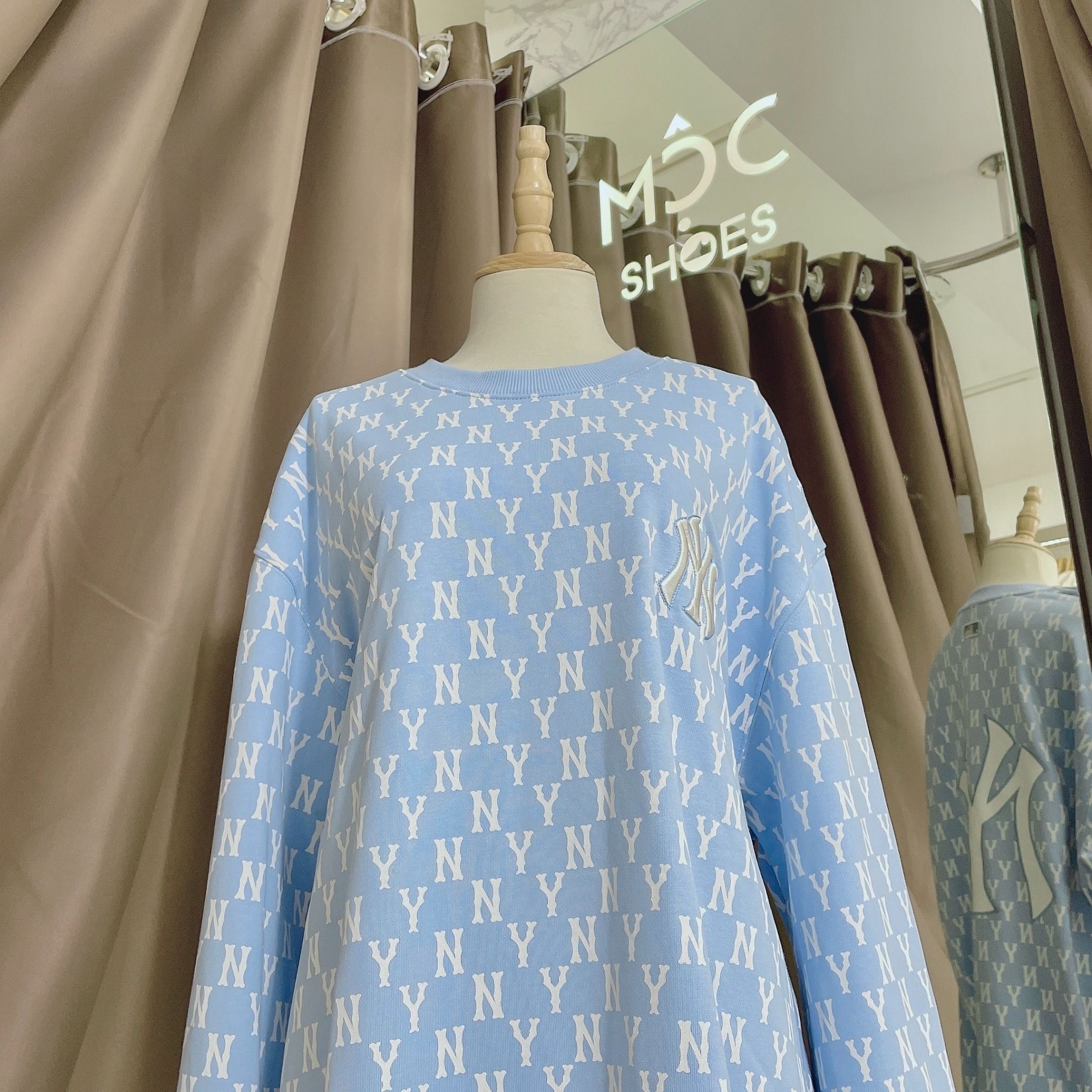 1662 - HÀNG CHÍNH HÃNG - ÁO SWEATER MLB MONOGRAM ALLOVER OVERFIT SWEATSHIRT NEW YORK *NY BABYBLUE* - CODE: 3AMTM0221-50BLL