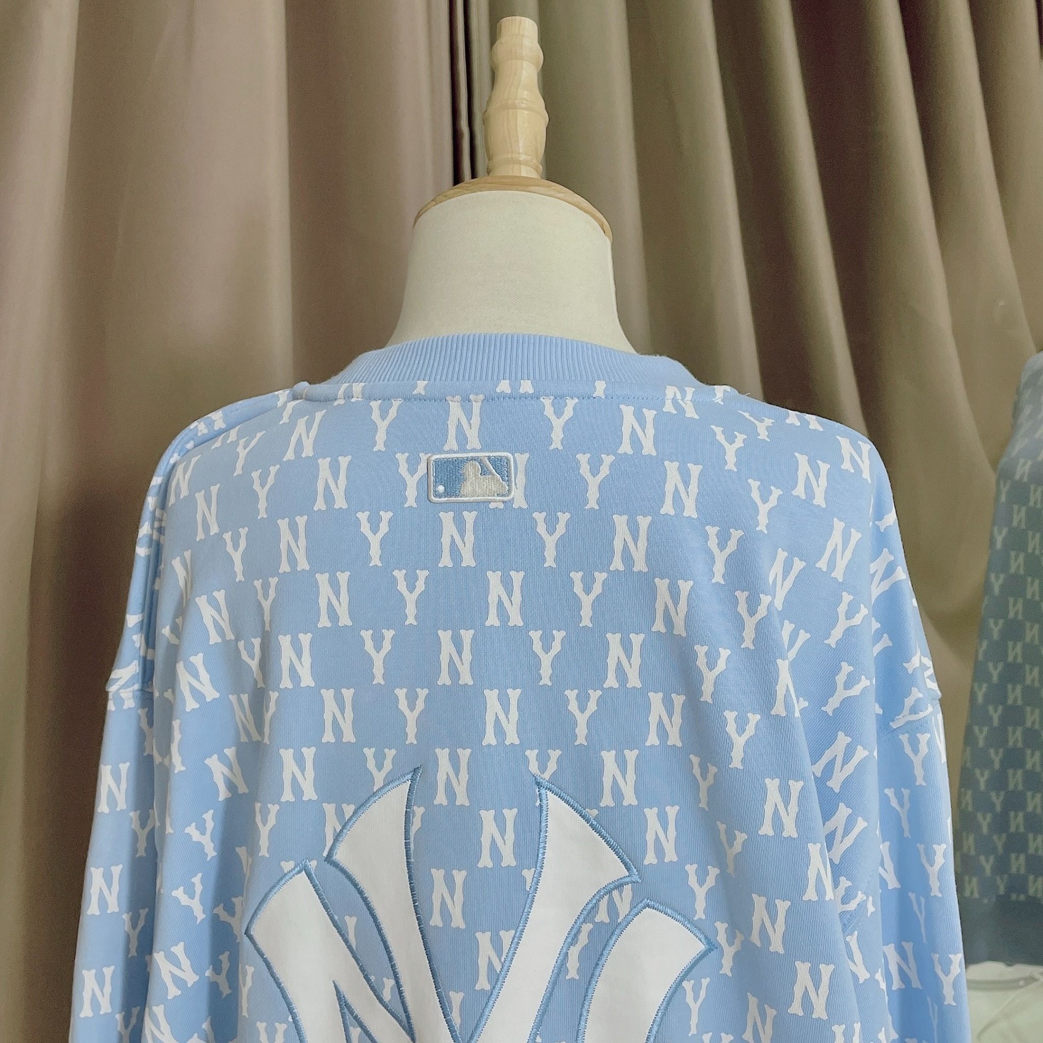 1662 - HÀNG CHÍNH HÃNG - ÁO SWEATER MLB MONOGRAM ALLOVER OVERFIT SWEATSHIRT NEW YORK *NY BABYBLUE* - CODE: 3AMTM0221-50BLL