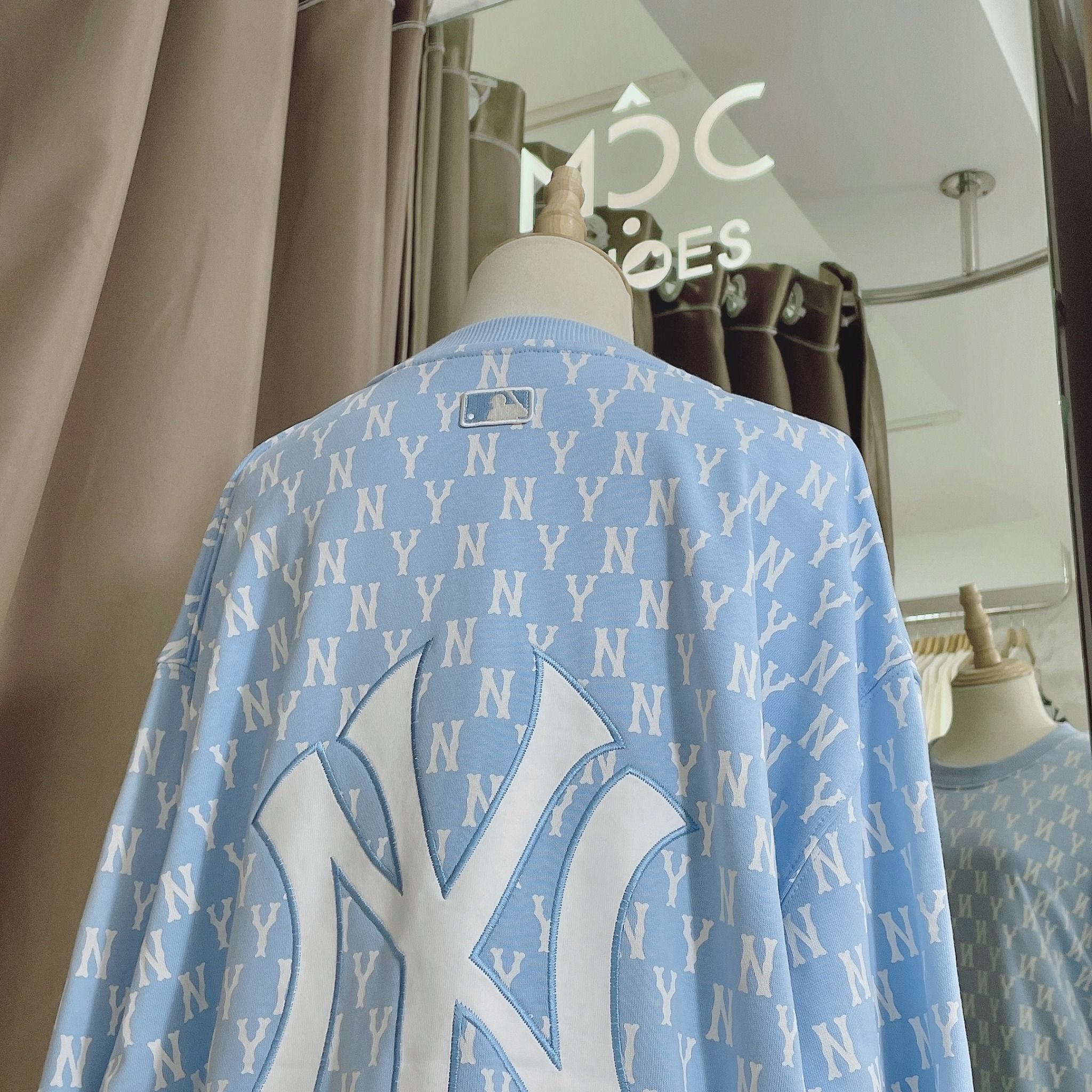 1662 - HÀNG CHÍNH HÃNG - ÁO SWEATER MLB MONOGRAM ALLOVER OVERFIT SWEATSHIRT NEW YORK *NY BABYBLUE* - CODE: 3AMTM0221-50BLL