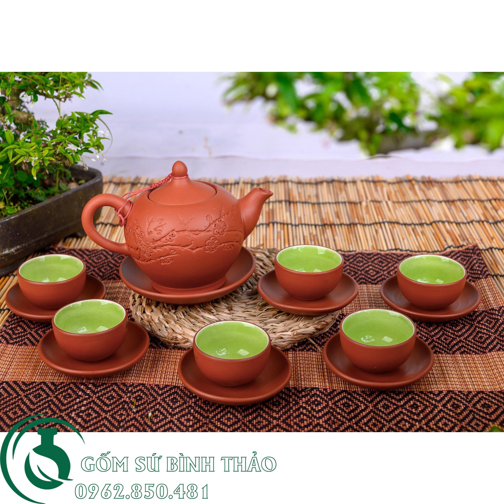 Bộ ấm trà chóp khắc đào tử sa Bát Tràng